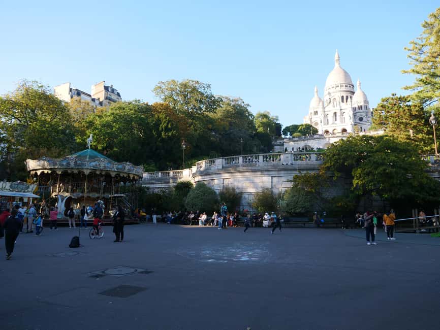Paris: Montmartre Must-See Walking Tour with a Local Guide - Starting at Place Saint-Pierre and Square Louise Michel
