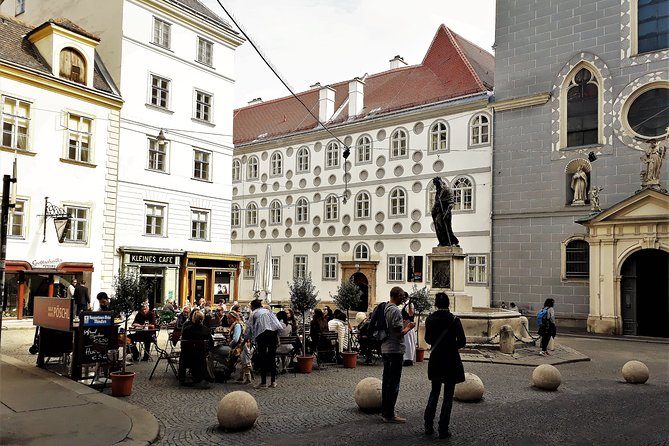 Private Hidden Vienna Walk — Stories Behind Quiet Corners - A basilisk in a quiet lane