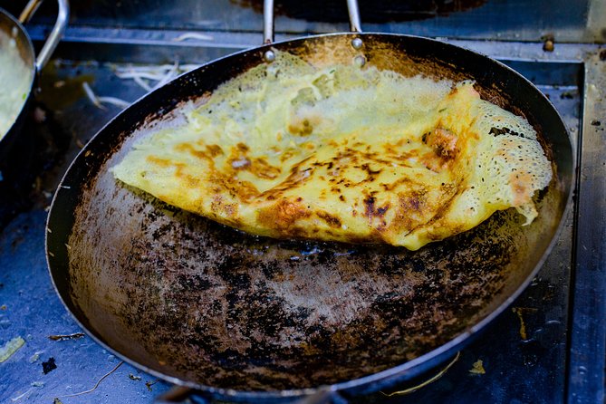 Private Street Food Evening Walking Tour in Ho Chi Minh City - Leaving the tourist center by taxi