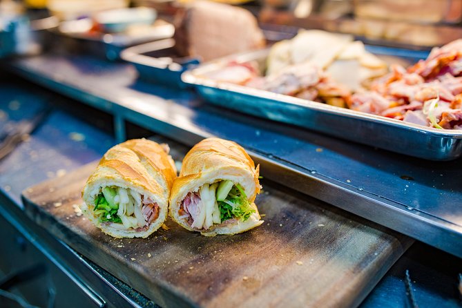 Private Street Food Evening Walking Tour in Ho Chi Minh City - Seafood, crab soup, and dishes you may not order alone