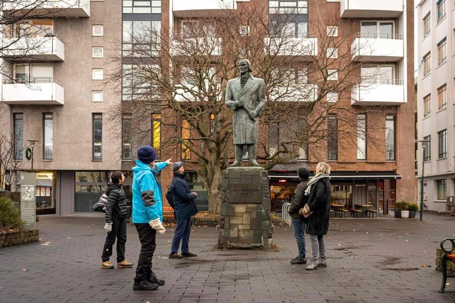 Reykjavik: Sightseeing Walking Tour with a Viking - Ingólfstorg and Austurvöllur: Reykjavik’s civic heart