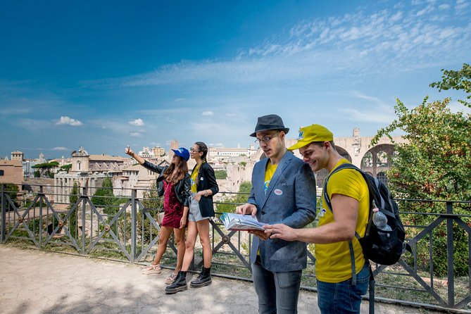 Rome: Colosseum Arena, Roman Forum & Palatine Hill Tour - Walking from the Colosseum toward Palatine Hill