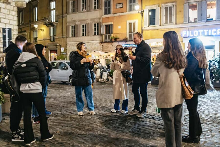 Rome: Small-Group City Highlights Moonlight Walking Tour - Piazza Navona begins with ancient athletics