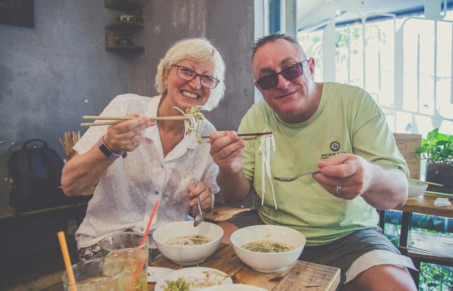 Saigon: Private Backstreets Walking Food Tour - Ho Thi Ky flower market and Cambodian market flavors