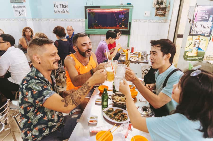 Saigon: Private Backstreets Walking Food Tour - Local snacks, sugarcane juice, and the city between meals