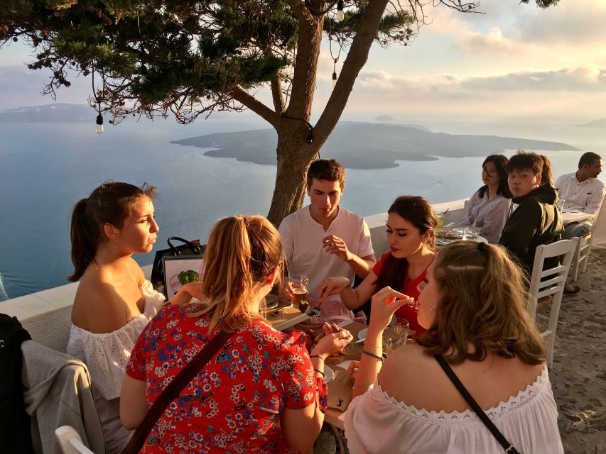 Santorini: Sunset Walking Tour with Local Food and Drinks - Firostefani’s blue dome and ancient seafood