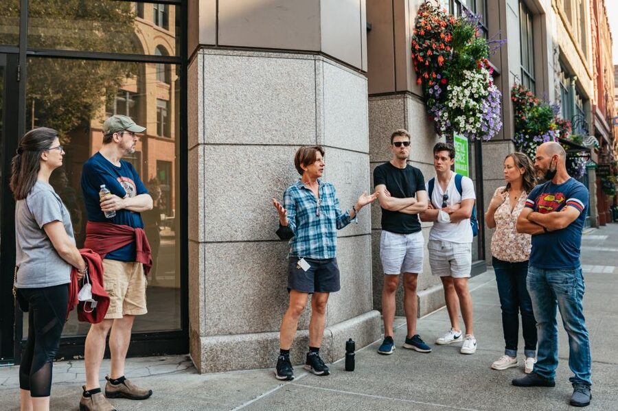 Seattle: Guided Underground Walking Tour - Walking through the three underground passageways