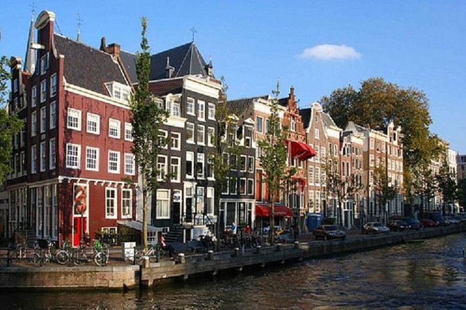 Secrets of Amsterdam Walking Tour plus Dutch Sweets Tasting - Bloemenmarkt and the city’s flower trade
