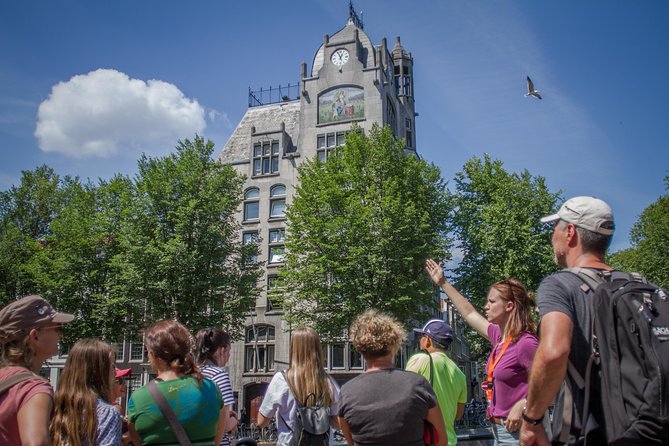 Secrets of Amsterdam Walking Tour plus Dutch Sweets Tasting - Begijnhof and a quieter corner