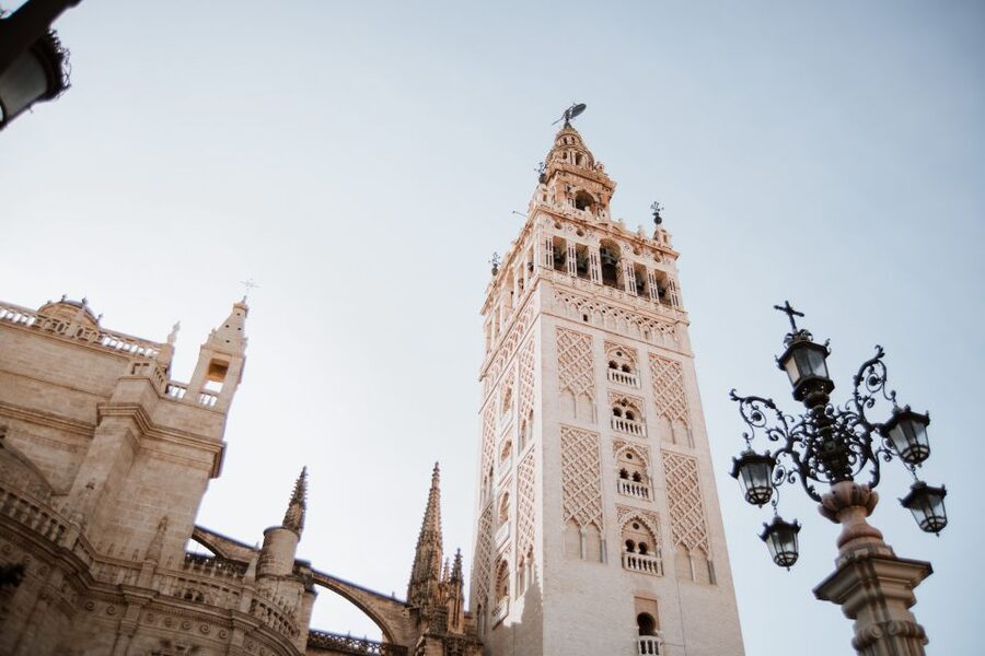 Seville Jewish Quarter walking tour: Santa Cruz District - Starting beneath the statue in Plaza del Triunfo