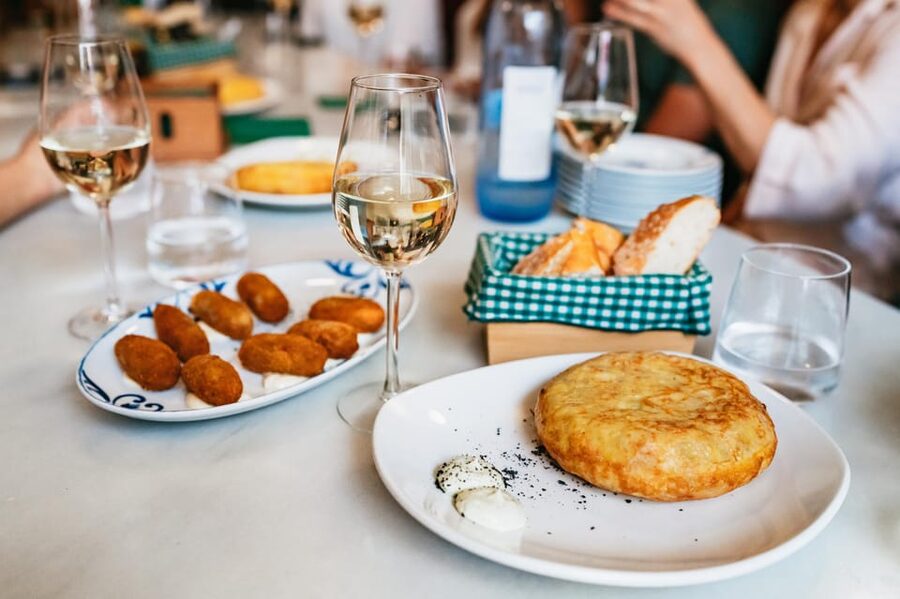Seville: Tapas, Taverns and History Guided Walking Tour - Small groups, private options, and the social side