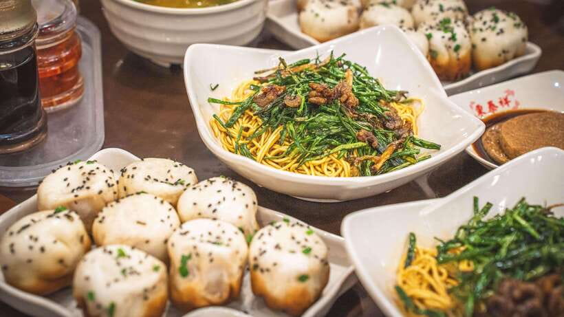 Shanghai: Evening Walking Food Tour - Shanghai’s noodles, buns, and other filling carbs