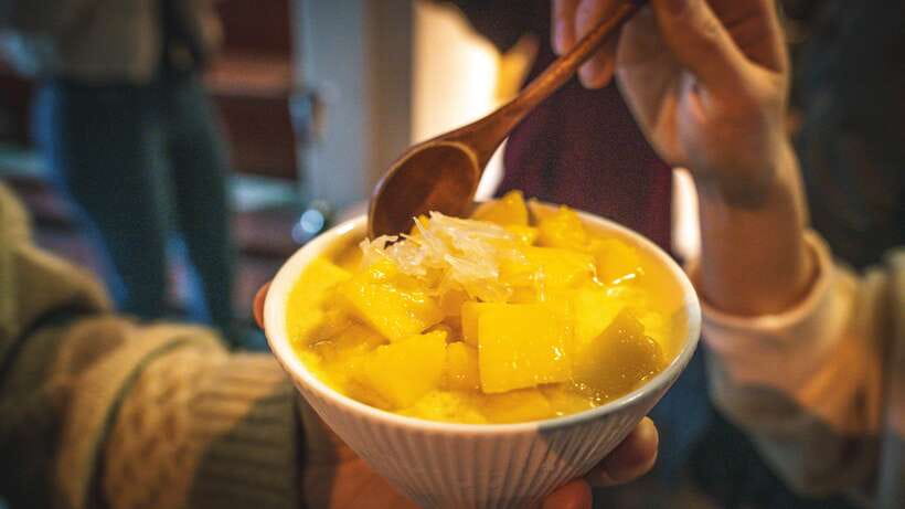 Shanghai: Evening Walking Food Tour - A chilled mango dessert with local character
