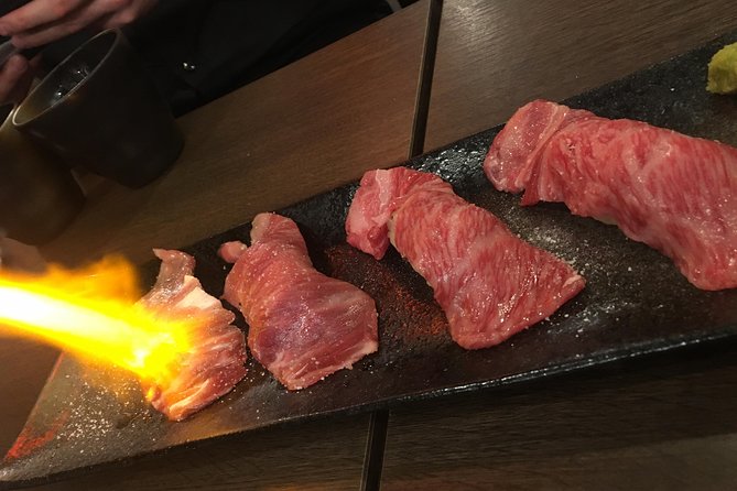 Shibuya Meltdown Nightlife Tour: All-You-Can-Drink Bar Hopping - Wagyu Niku Yokocho and the first proper meal