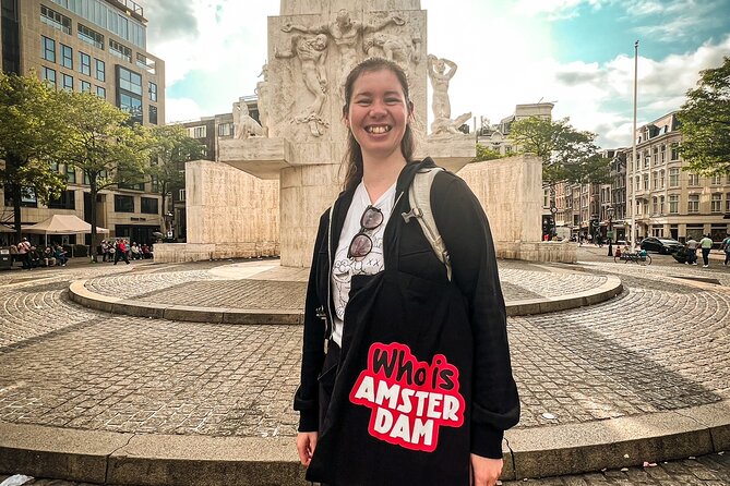 Small Group Walking Tour - Hello Amsterdam - Damrak, dancing houses, and a true-or-false game