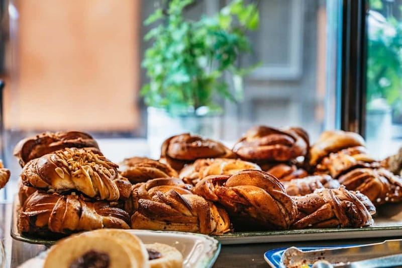 Stockholm: Swedish Food Guided Walking Tour - Walking through modern Stockholm between market stops