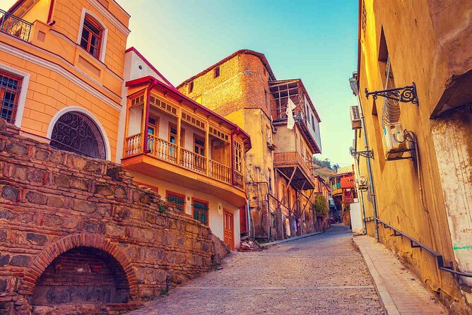 Tbilisi:Evening Walking & Talking Tour with Wine & Boat Ride - What the pace and group size feel like