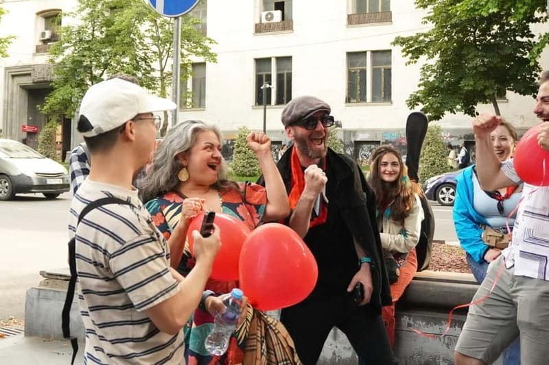 Tbilisi: Evening Walking Tour with Wine & Boat Ride Options - Key points at a glance