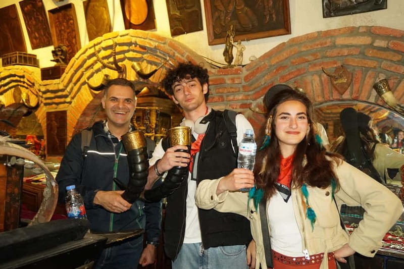 Tbilisi: Evening Walking Tour with Wine & Boat Ride Options - Rezo Gabriadze’s Clock Tower and the Old Town lanes