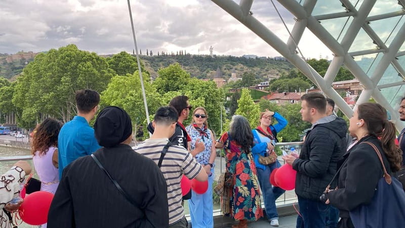 Tbilisi: Evening Walking Tour with Wine & Boat Ride Options - Georgian wine tasting at the end