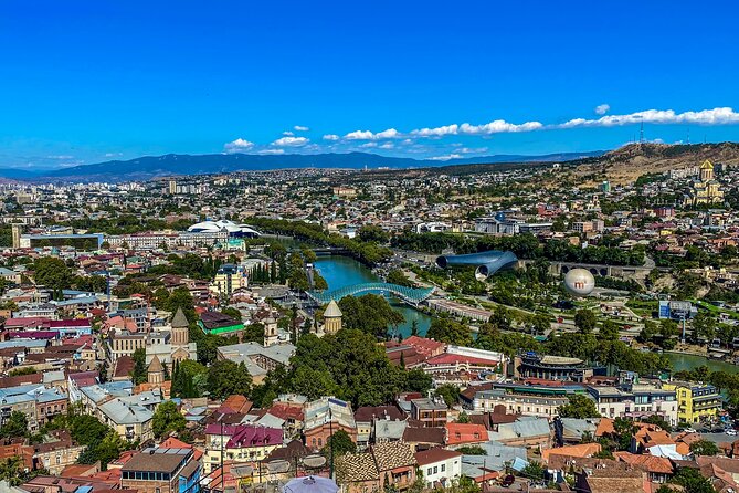 Tbilisi Walking Tour Including Cable Car and Traditional Bakery - Clock tower, Sioni Cathedral, and Old Tbilisi stories