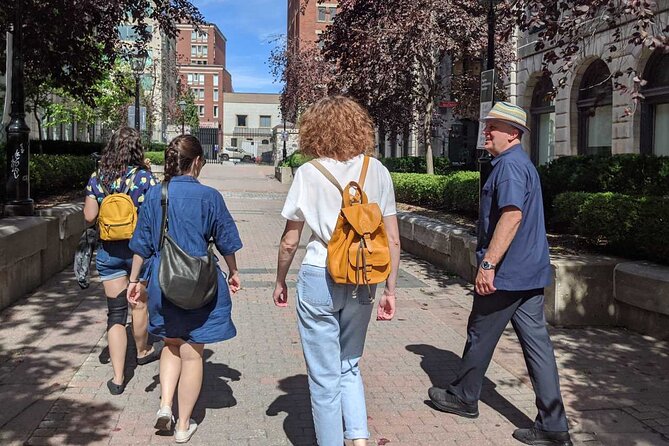 The Original Old Montréal Walking Tour by Guidatour - Place dArmes, the Royal Bank, and Montréals public face