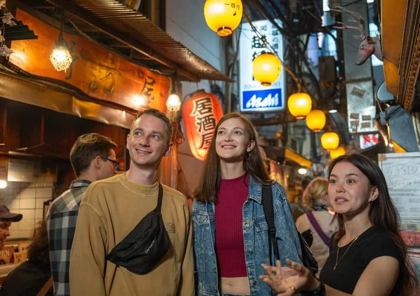 Tokyo: Shinjuku Bar Hopping & Night Walking Tour - Kabukicho after dark, with neon and surprises