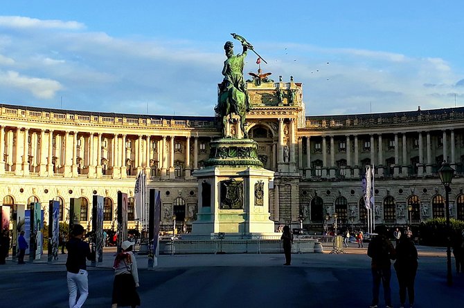 Vienna at First Glance a Private Walking Tour for First Timers - Goldenes Quartier shows modern Vienna beside old Vienna